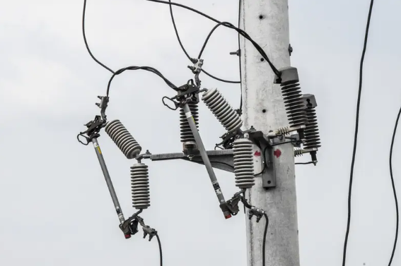 Revolutionizing Grid Protection: Research on Intelligent Outdoor Drop-Out Fuse Open-Close Technology