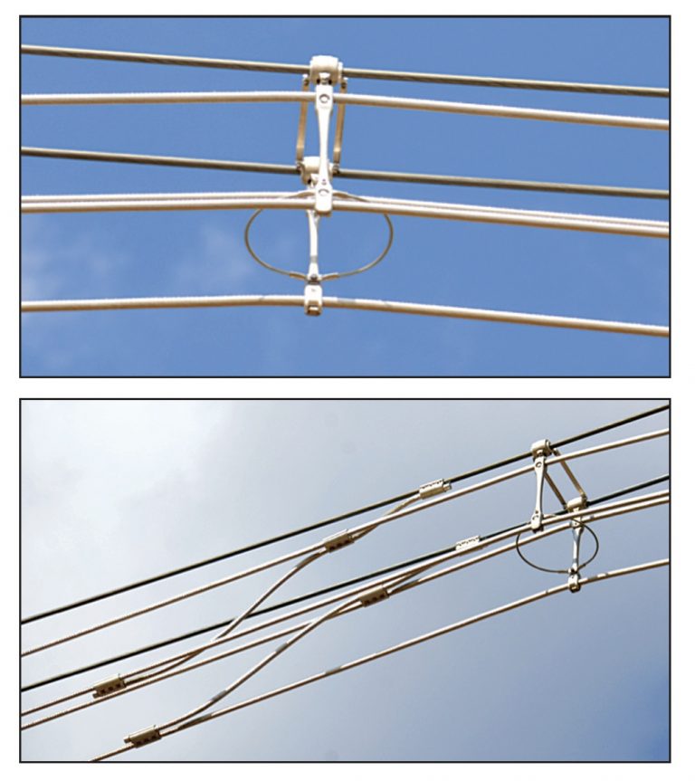 Fig.-7-Unique-spacer-serves-dual-function-of-maintaining-required-spacing-between-sub-conductors-and-attaching-conductor-bundle-to-steel-wire-supports-while-allowing-as-much-movement-as-possible.